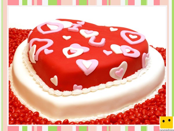 Tarta decorada con corazones de fondant