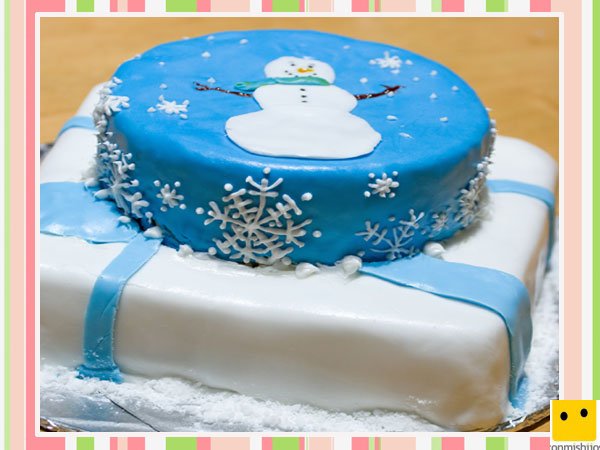 Tarta de fondant decorada con dibujos del invierno