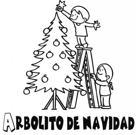 Niños decorando el árbol de Navidad. Imágenes gratis