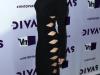 La nueva imagen de Hannah Montana con vestido negro largo y con aberturas laterales