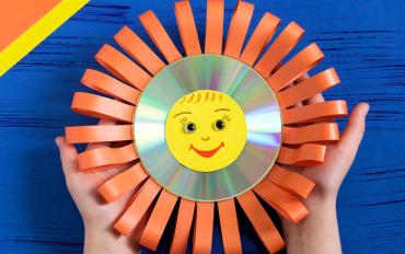 Sol decorativo. Manualidades con CDs reciclados para niños